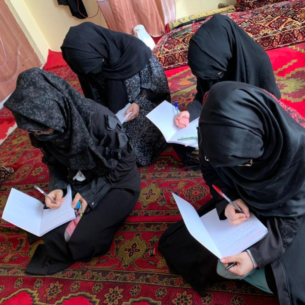 Afghan girls with their notebooks