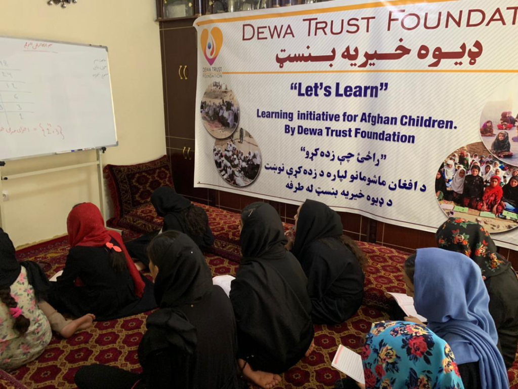 Girls learning in a community classroom